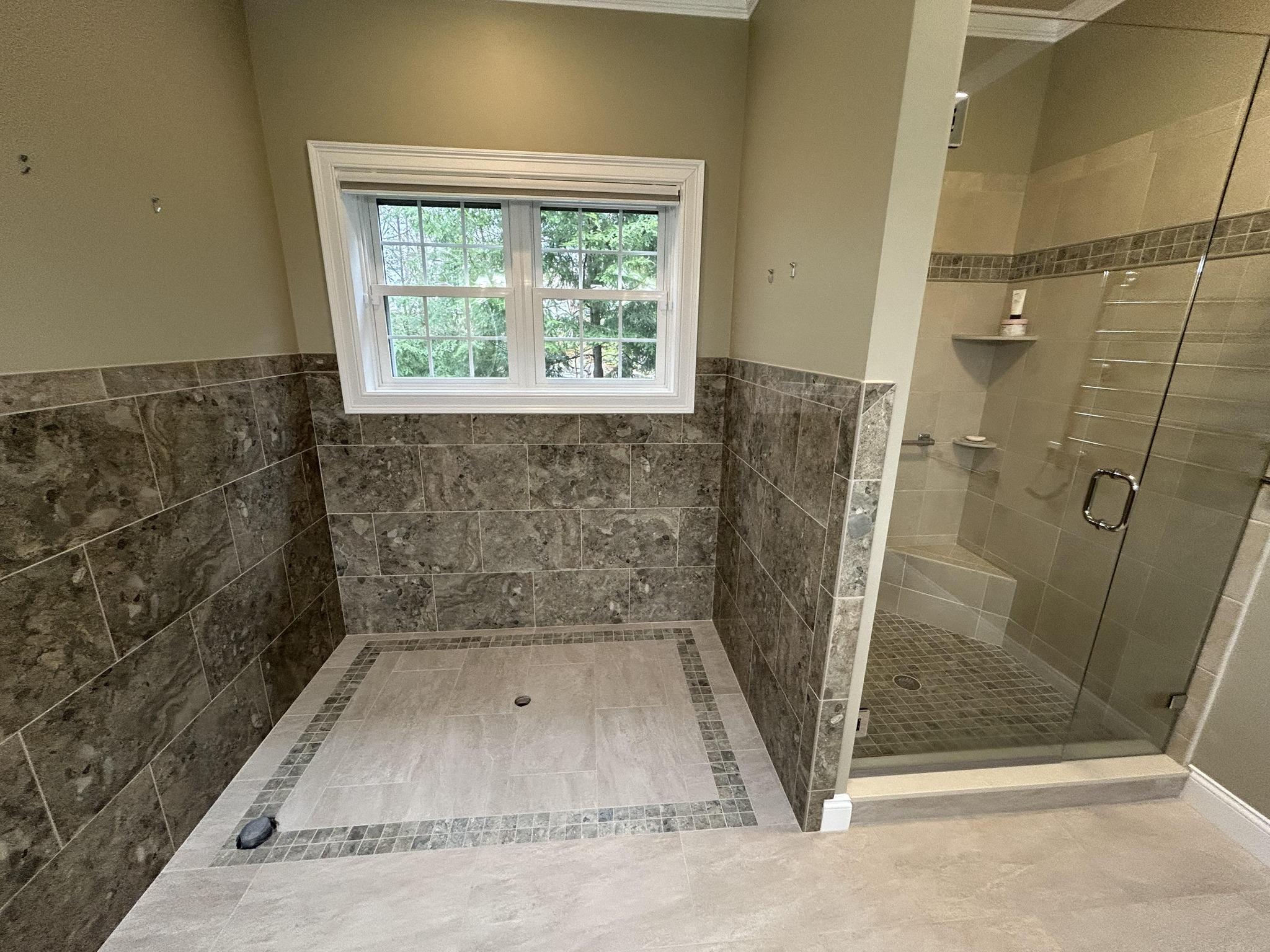 Custom tiled bathroom with walk-in shower